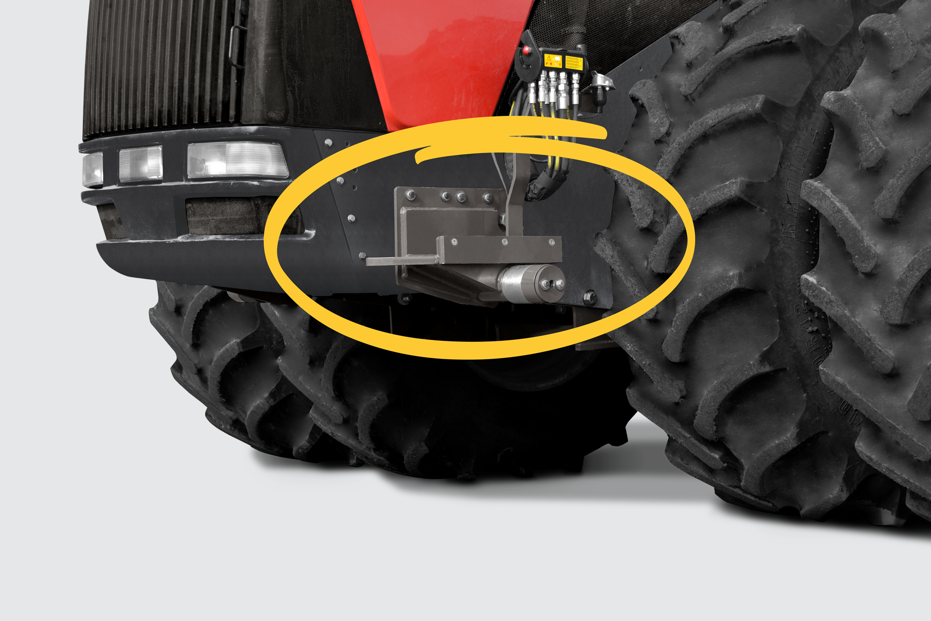 Two products are in this image, the front product is the 4WD Pitbull Blade with the mount as shown from the rear to better show the setup. The second product is the tractor with the HUB undermount system in place.